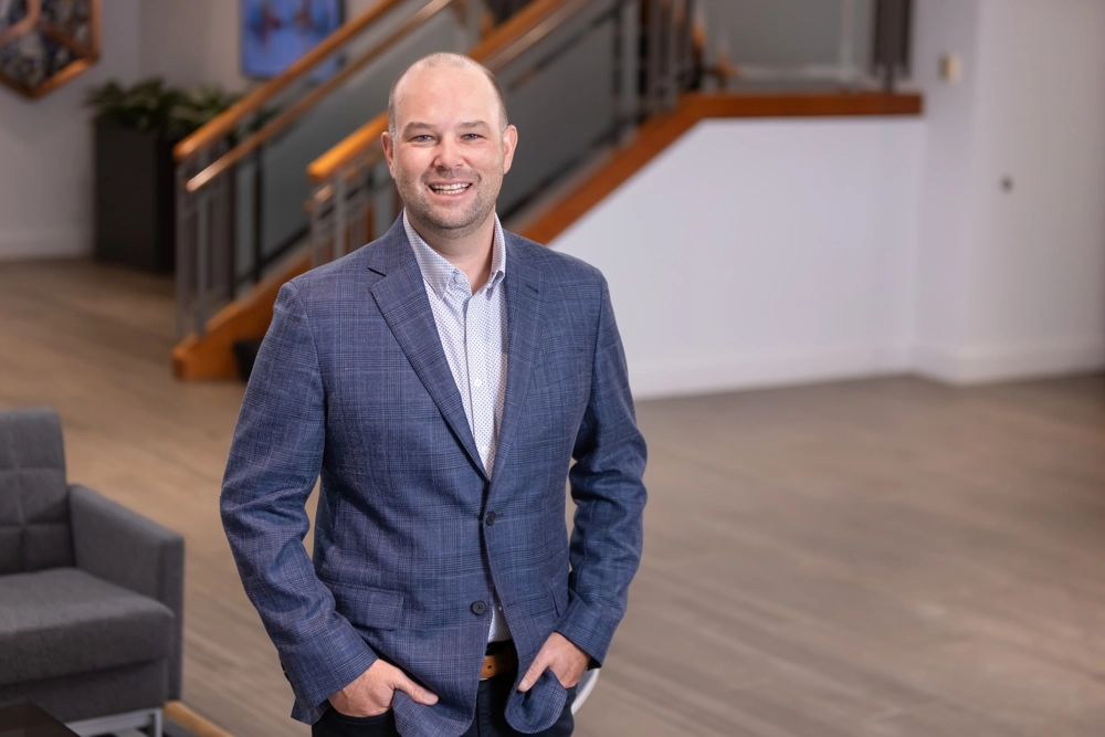 portrait of a smiling person in professional attire